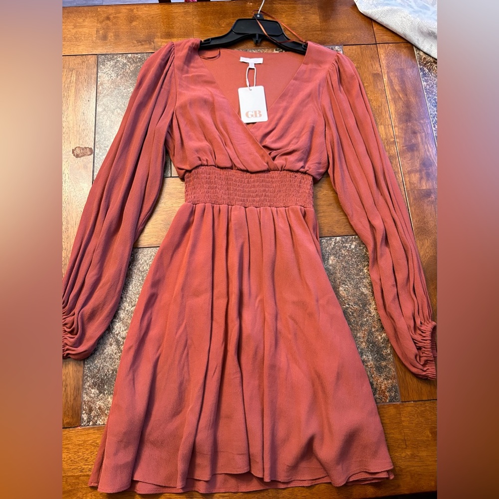 New with tags orange/brown GB dress. Size S never worn